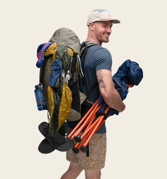 MAN WITH HIKING GEAR