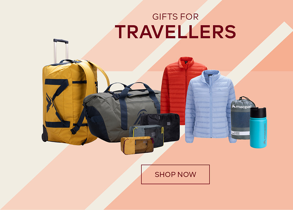 Gifts For Travellers - Shop Now - Yellow wheeled Duffell Bag, grey duffell bag, 2 puffer Jackets, packing cells and drinkware.