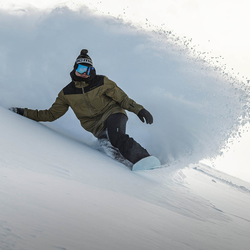 Snowboarder Wearing Powder Reflex Ski Jacket